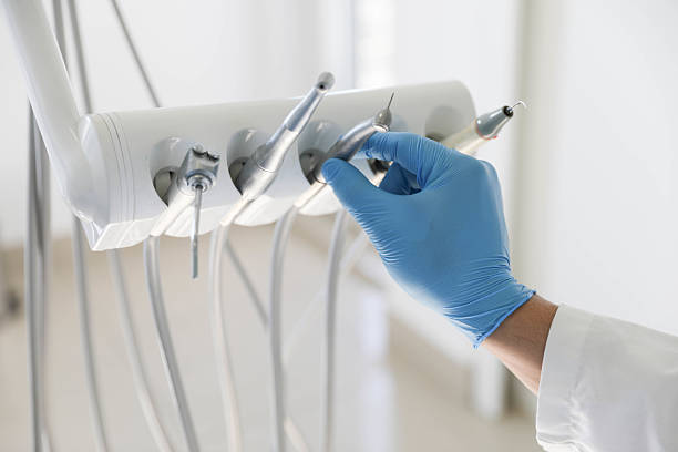 Professional Tooth Extraction technician working in Centreville, VA